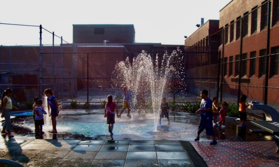 kids playing in splash pad